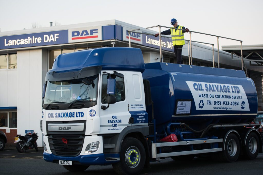 an Oil Salvage vehicle in front of a Lancashire DAF garage 